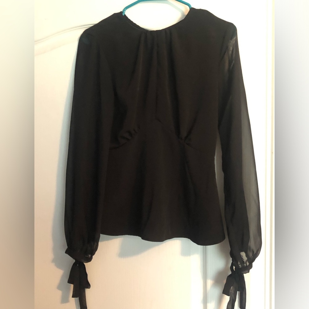 Black peplum blouse 6 by Topshop.